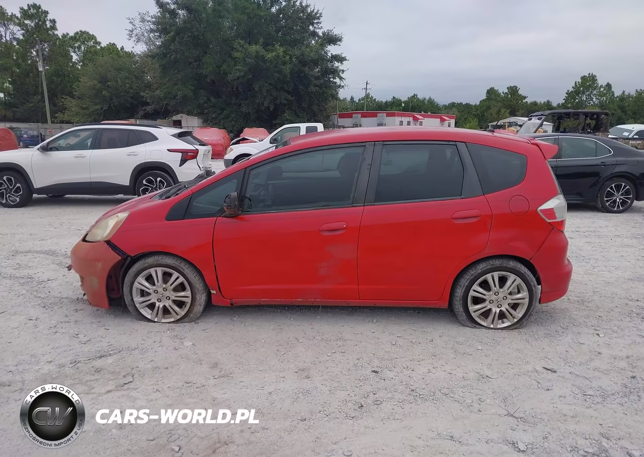 2009 Honda Fit Sport VIN:JHMGE884X9S047039 - 14