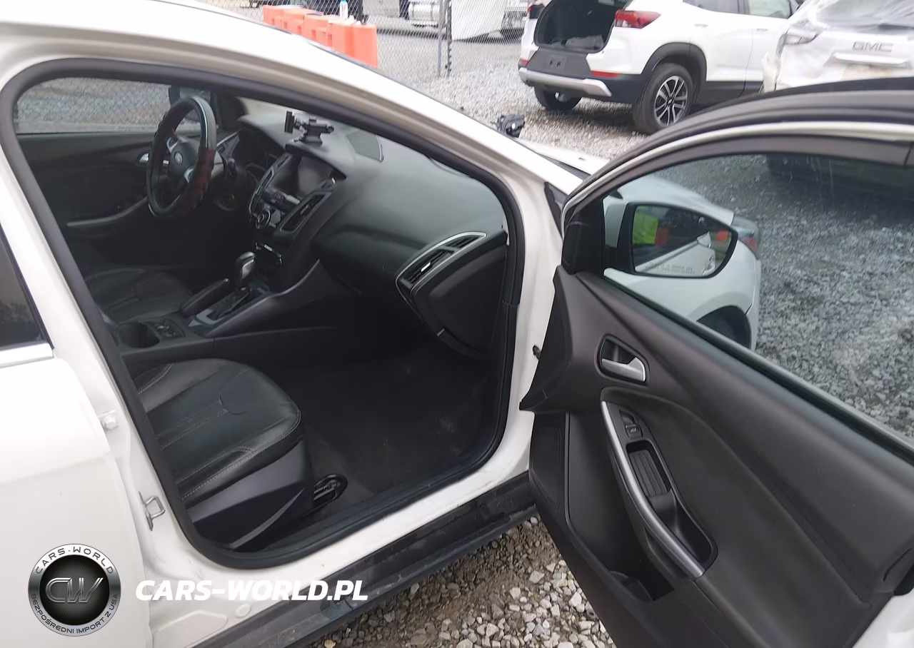2014 Ford Focus Titanium VIN:1FADP3N27EL208705 - 5