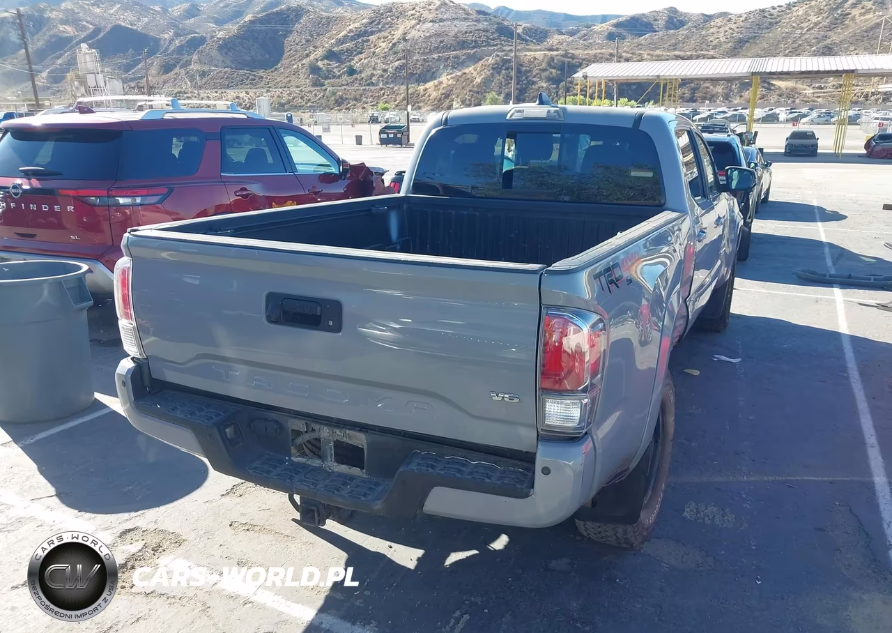 2021 Toyota Tacoma VIN:3TMDZ5BN1MM102309 - 4