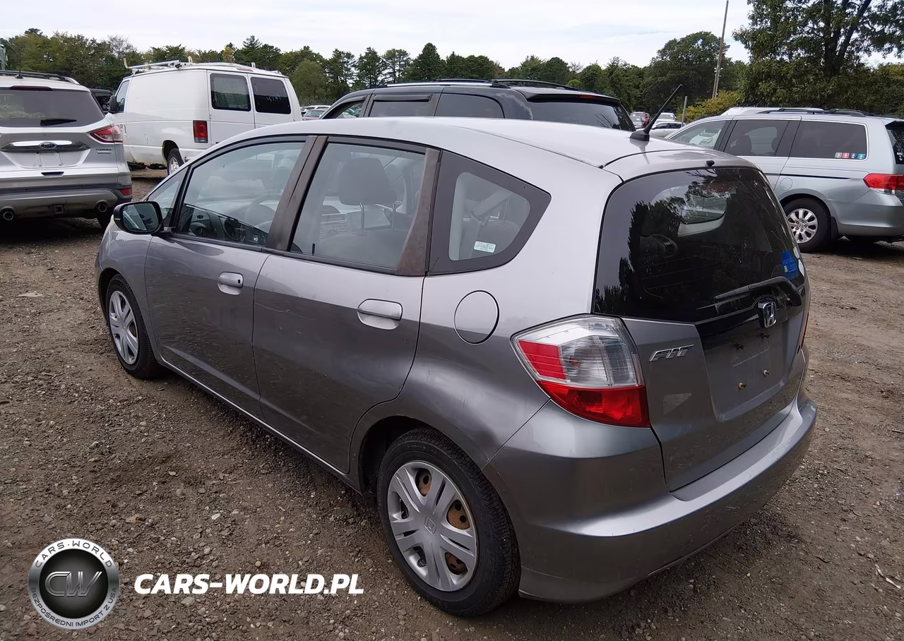 2009 Honda Fit VIN:JHMGE88259S055015 - 3