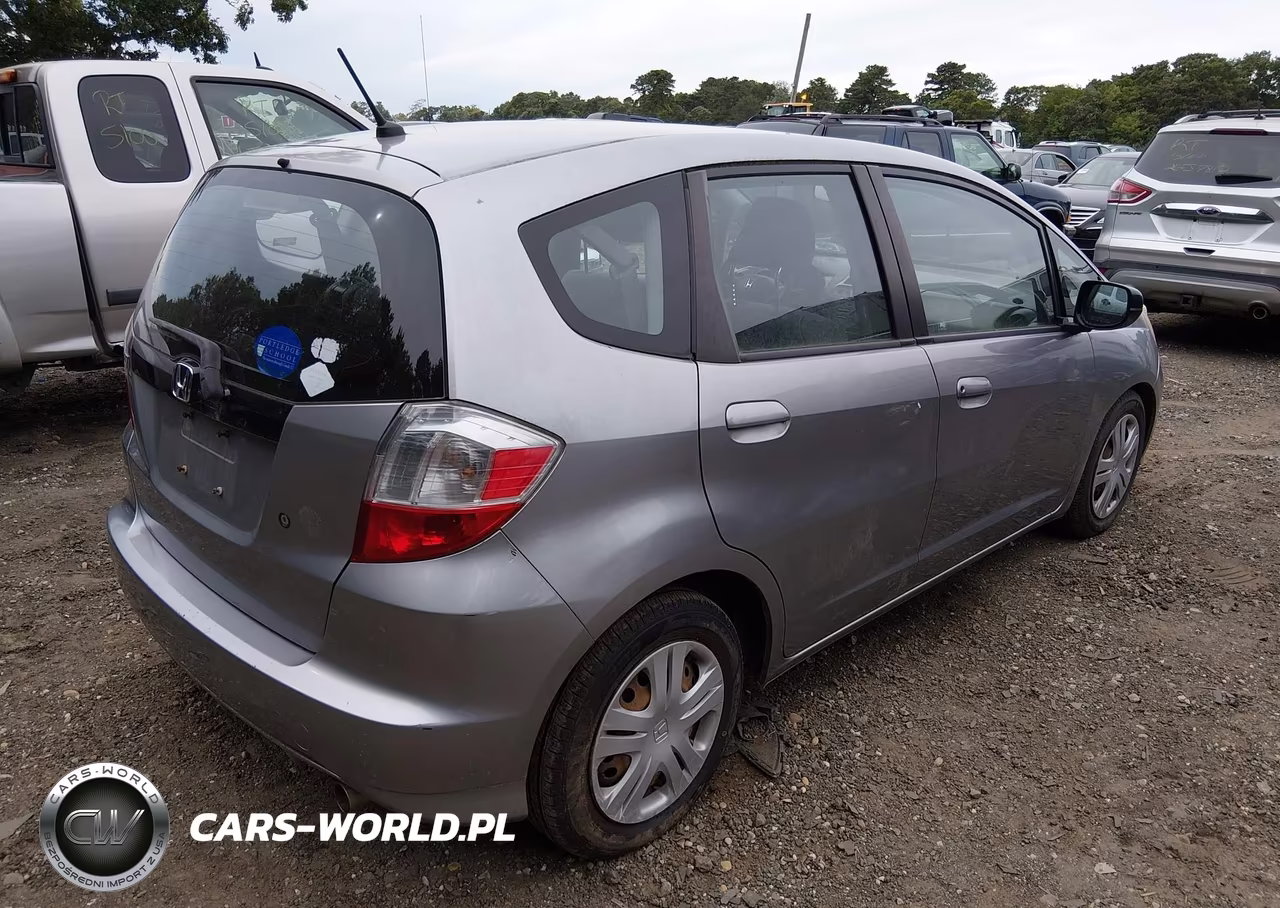 2009 Honda Fit VIN:JHMGE88259S055015 - 4