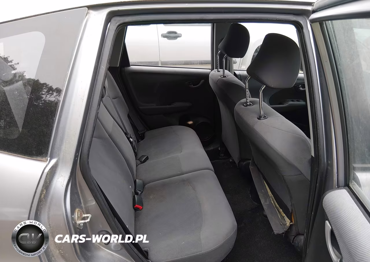 2009 Honda Fit VIN:JHMGE88259S055015 - 8