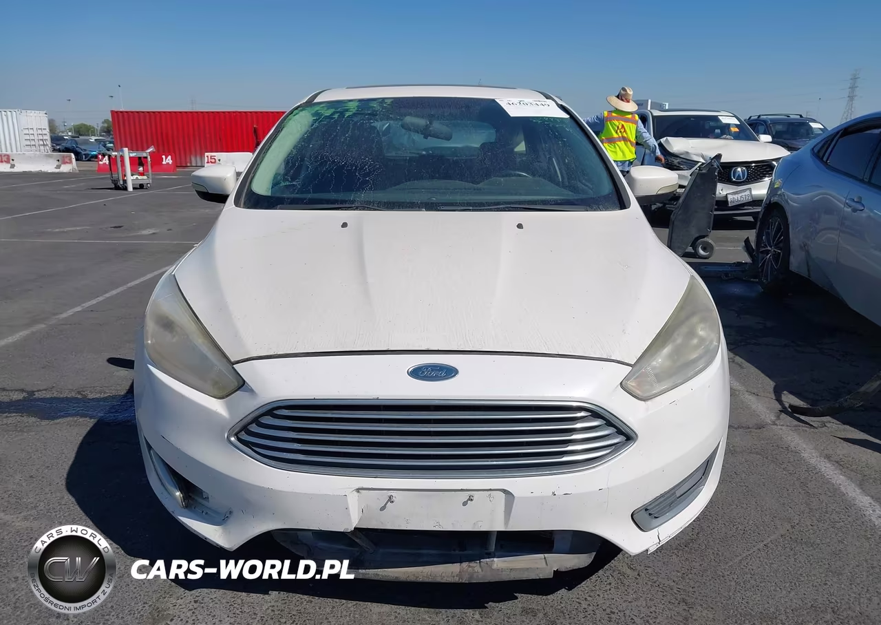 2016 Ford Focus Titanium VIN:1FADP3N21GL201168 - 12