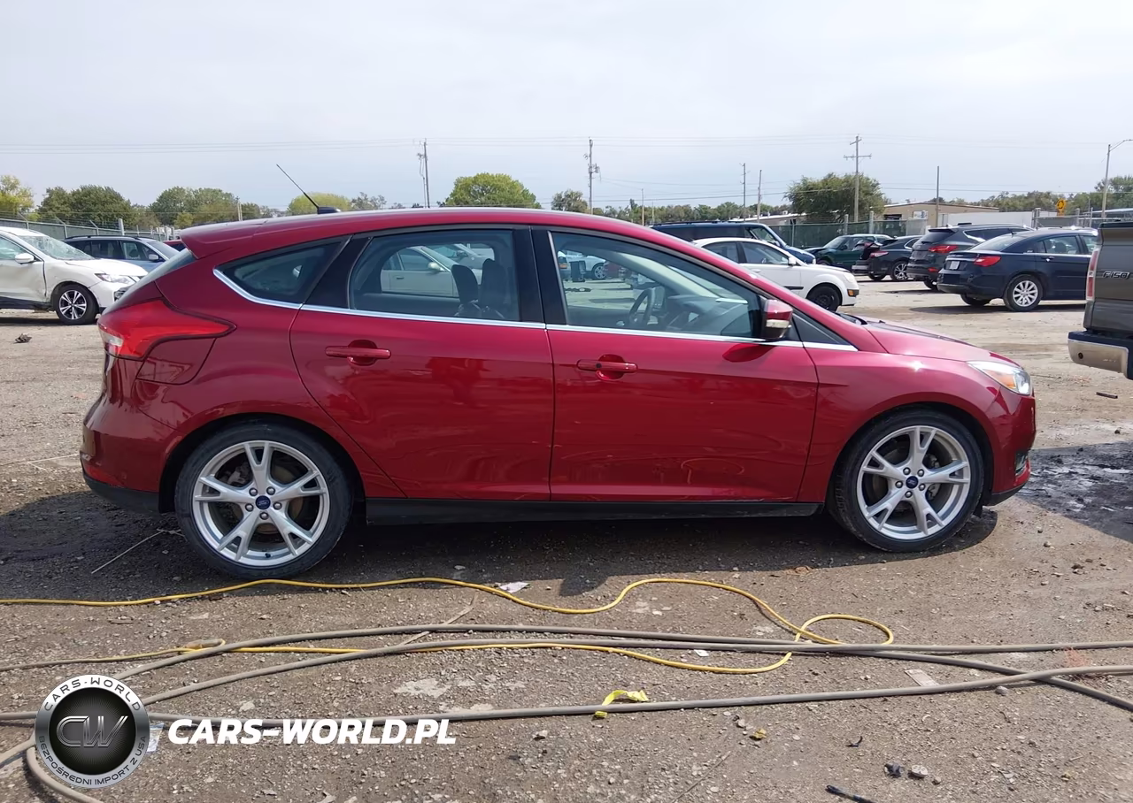 2016 Ford Focus Titanium VIN:1FADP3N25GL319126 - 13