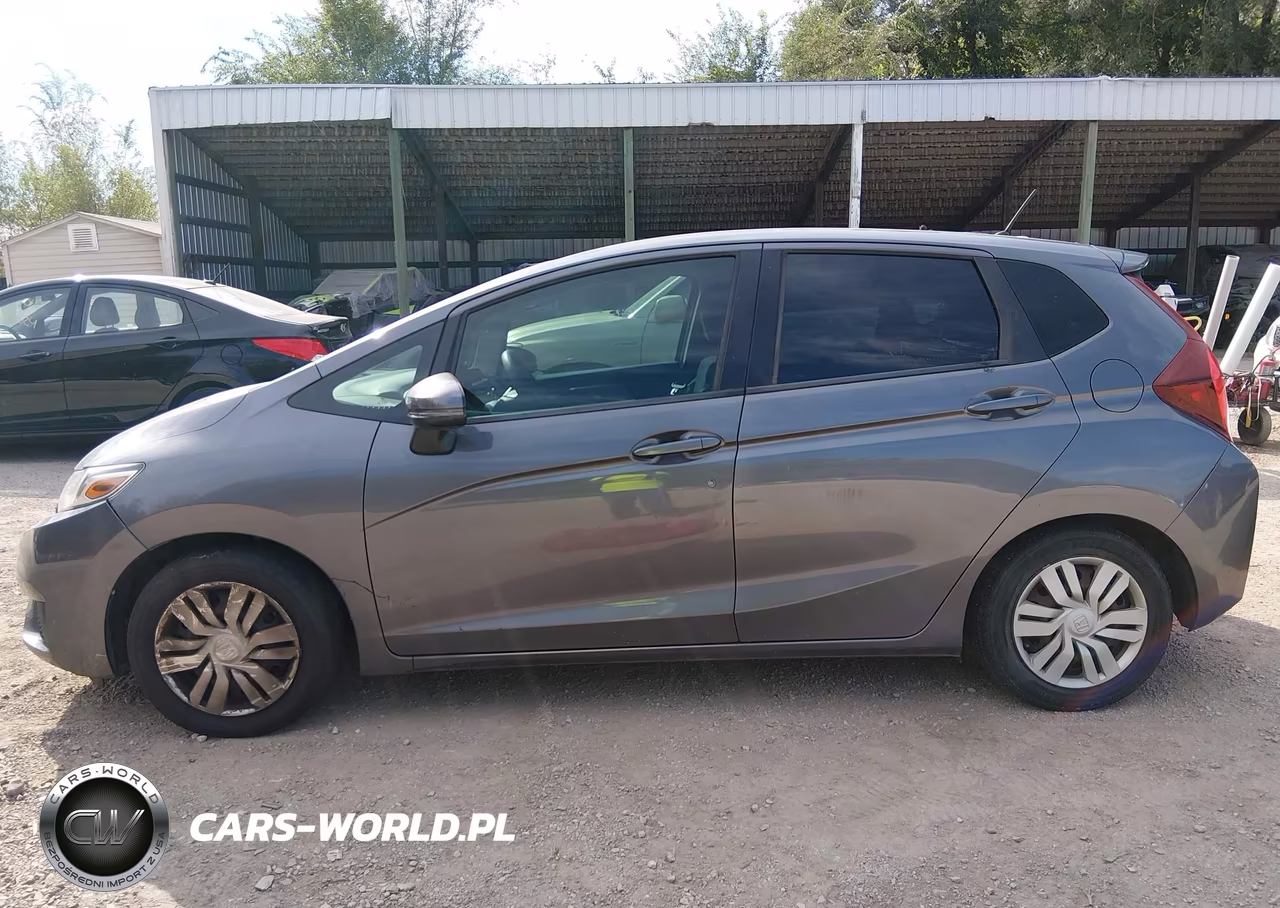 2015 Honda Fit Lx VIN:3HGGK5H55FM705888 - 14