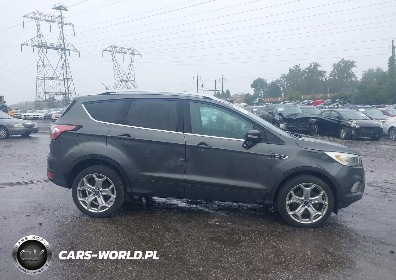 2017 Ford Escape Titanium VIN:1FMCU9J99HUC30770 - 13