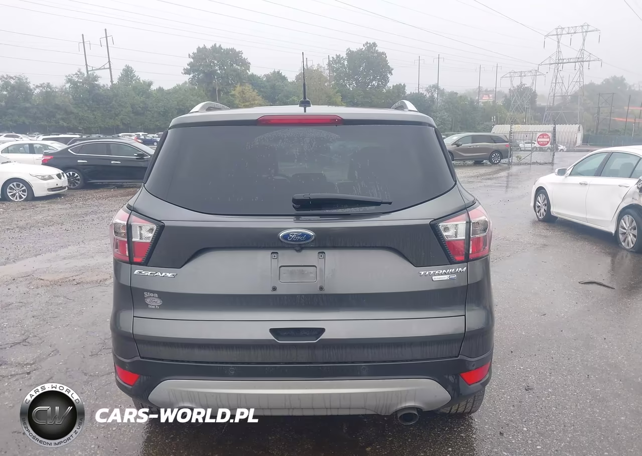 2017 Ford Escape Titanium VIN:1FMCU9J99HUC30770 - 16