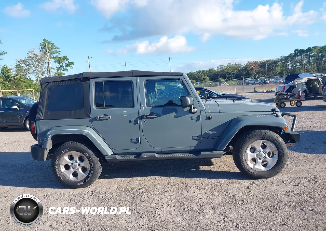 2015 Jeep Wrangler Unlimited Sahara VIN:1C4BJWEG8FL527144 - 13