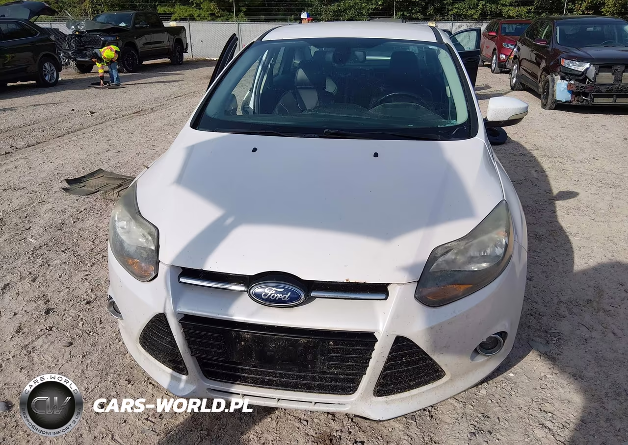 2012 Ford Focus Titanium VIN:1FAHP3J29CL480256 - 13