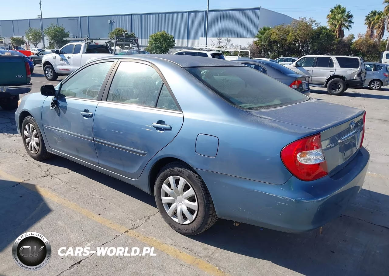 2003 Toyota Camry Le VIN:JTDBE32K830230853 - 3