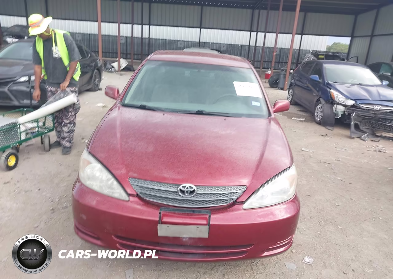 2002 Toyota Camry Le VIN:JTDBE32K520126464 - 12