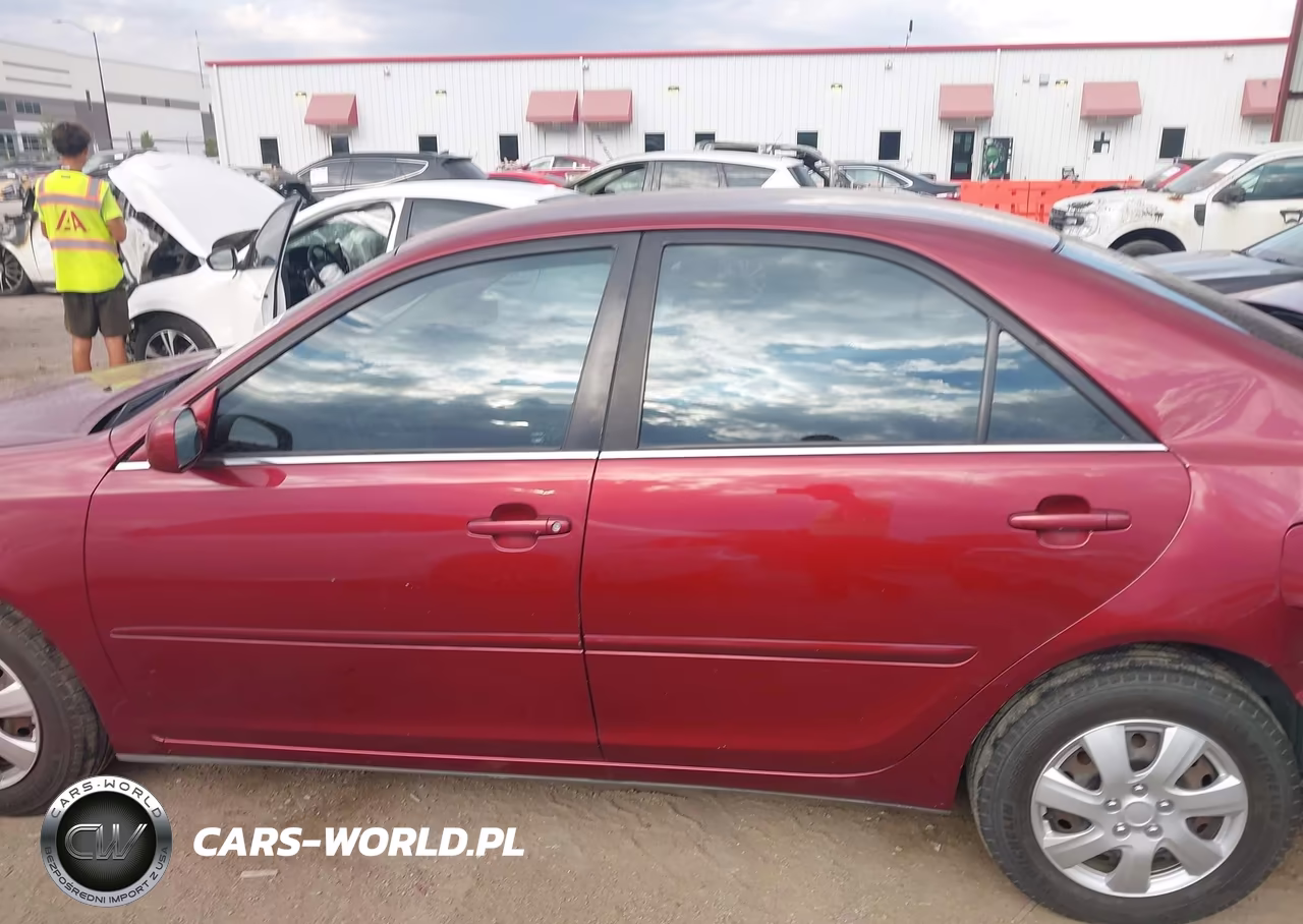 2002 Toyota Camry Le VIN:JTDBE32K520126464 - 14