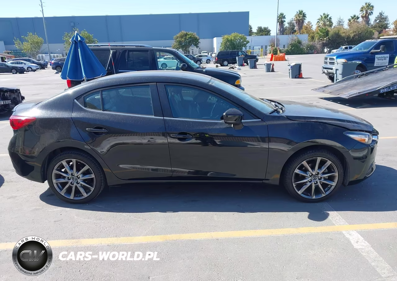 2018 Mazda Mazda3 Touring VIN:3MZBN1V34JM201463 - 13