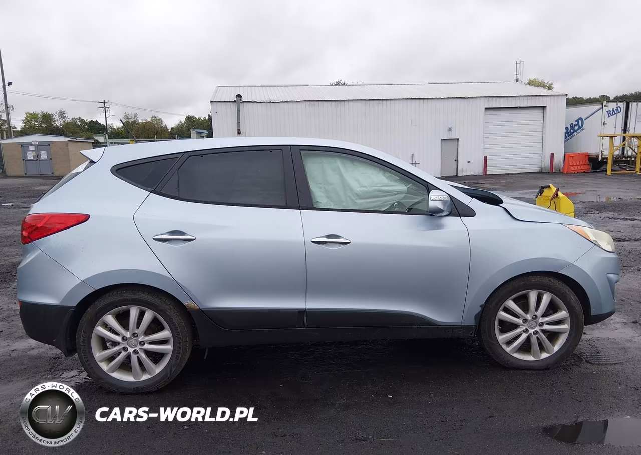 2011 Hyundai Tucson Limited VIN:KM8JUCAC2BU203384 - 13