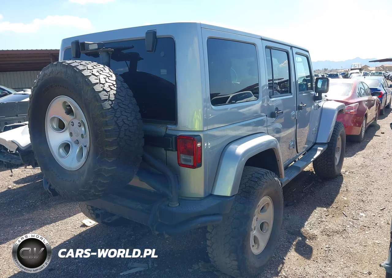 2014 Jeep Wrangler Unlimited Sahara VIN:1C4BJWEGXEL253699 - 4