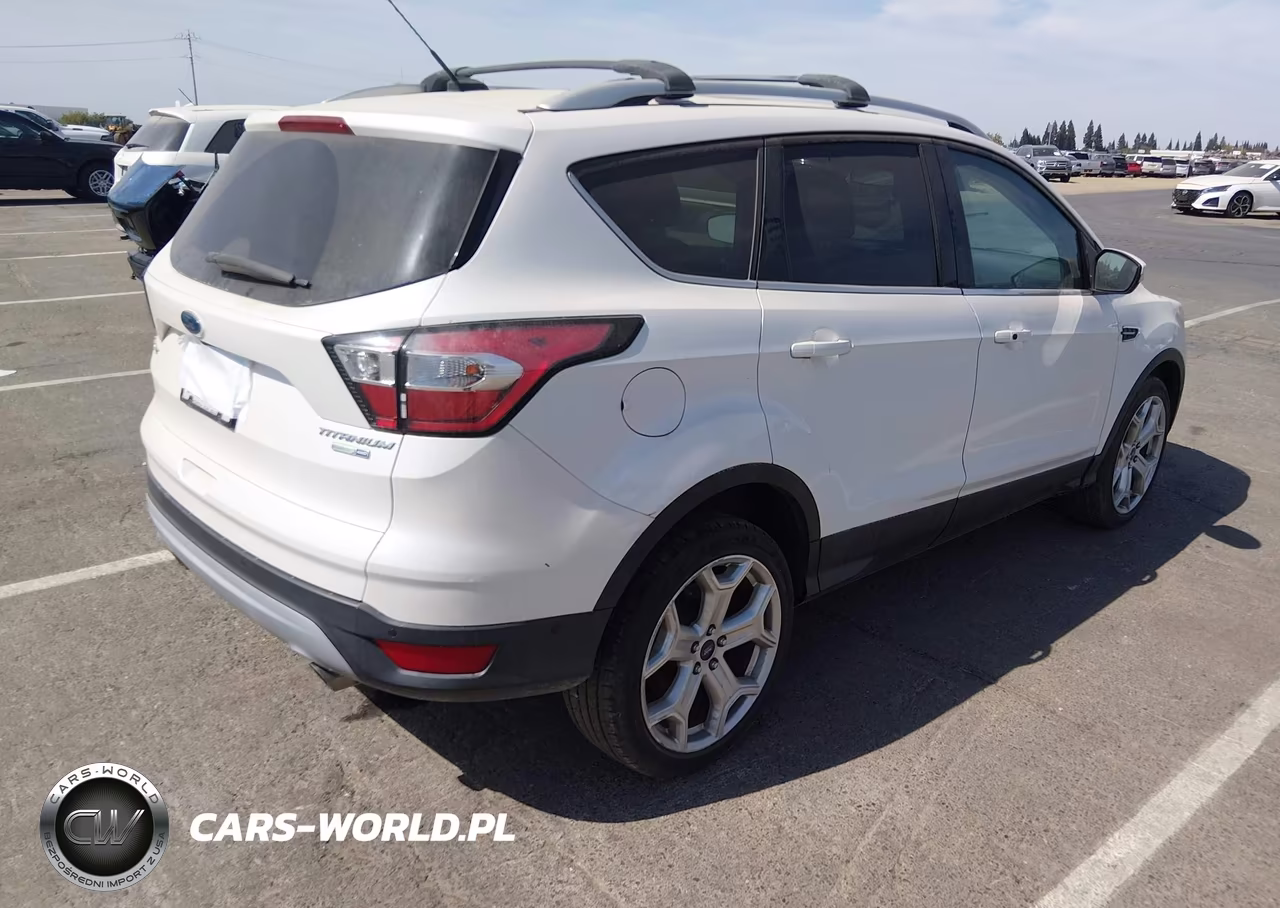2017 Ford Escape Titanium VIN:1FMCU9JD0HUE32143 - 4