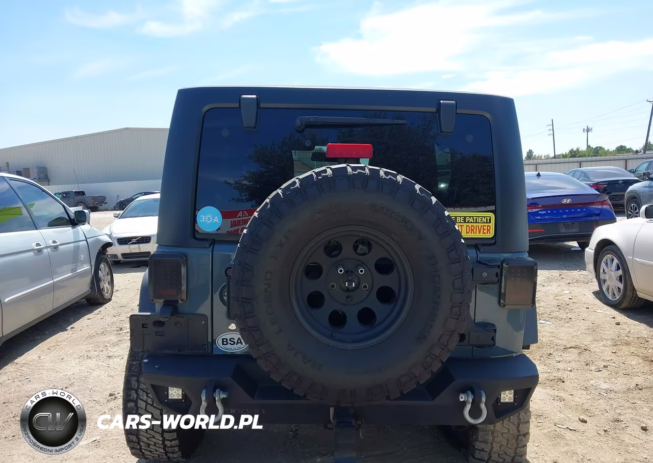 2014 Jeep Wrangler Unlimited Rubicon VIN:1C4BJWFG2EL165714 - 16