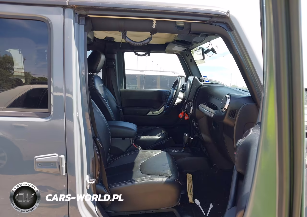 2014 Jeep Wrangler Unlimited Rubicon VIN:1C4BJWFG2EL165714 - 5