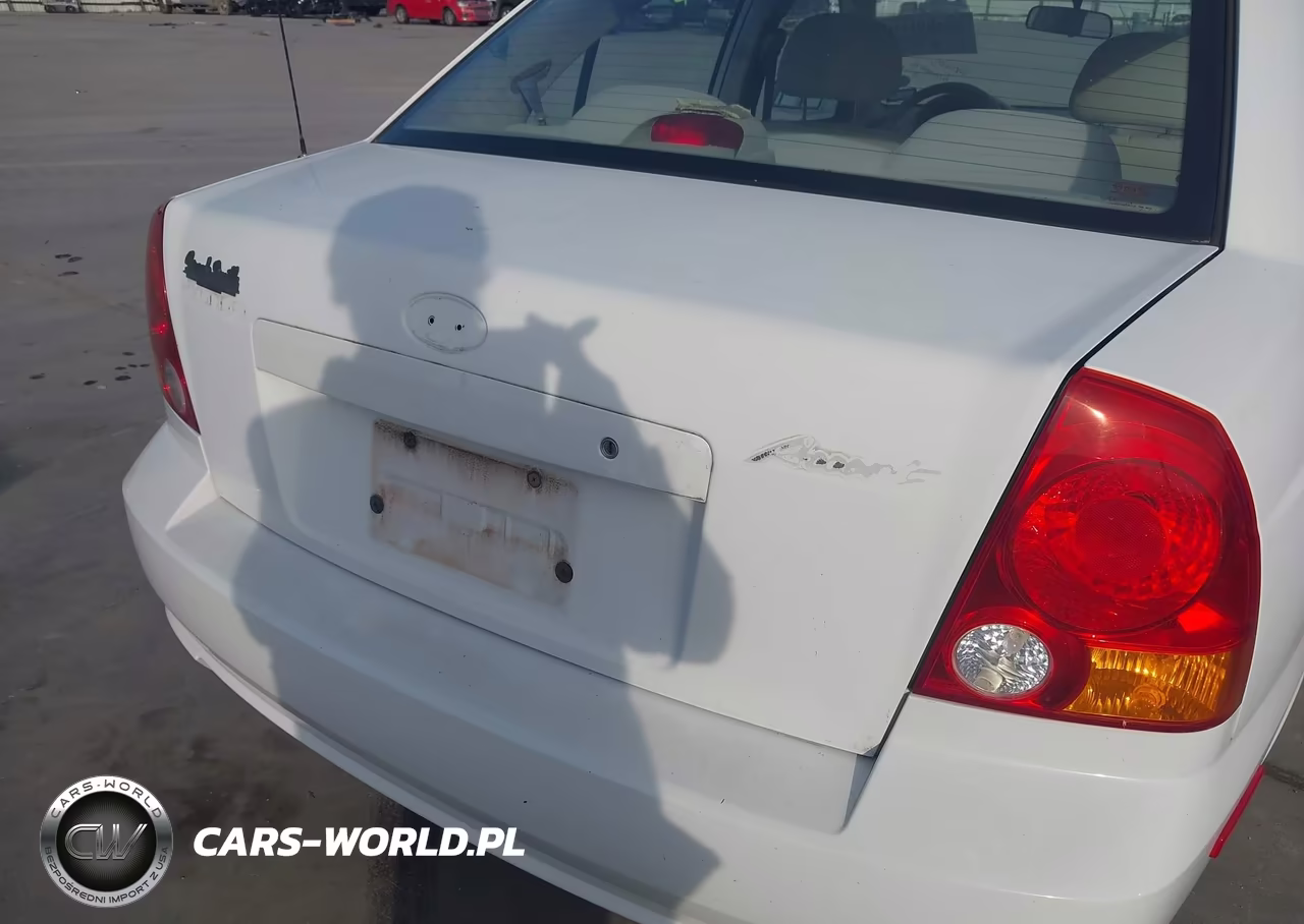 2005 Hyundai Accent Gls VIN:KMHCG45C65U605770 - 13