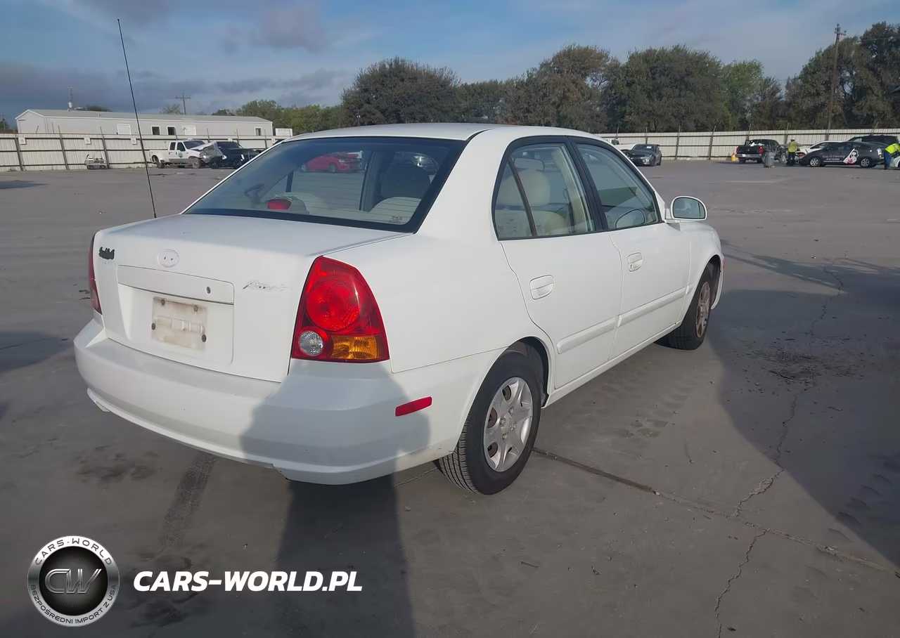2005 Hyundai Accent Gls VIN:KMHCG45C65U605770 - 4
