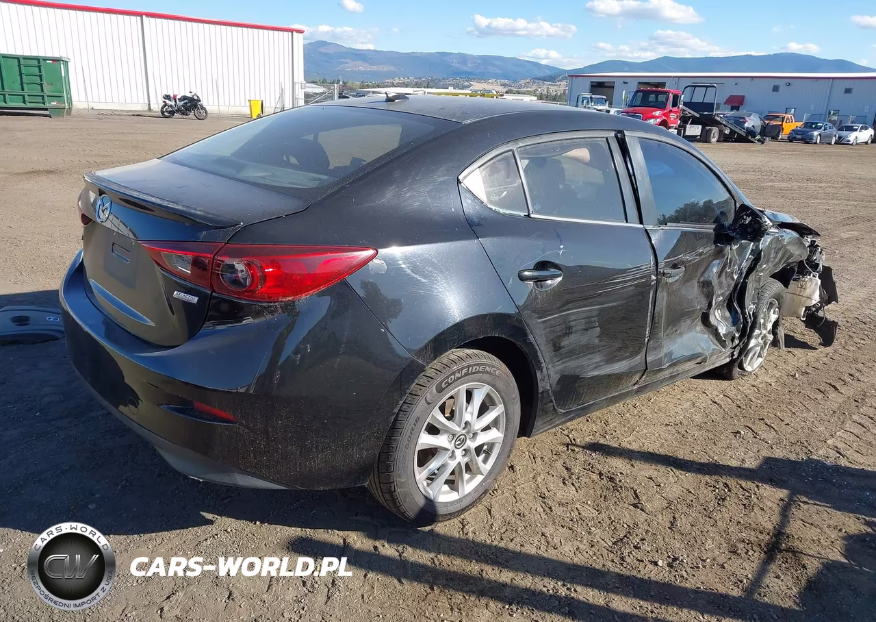 2014 Mazda Mazda3 I Touring VIN:JM1BM1V72E1129948 - 4