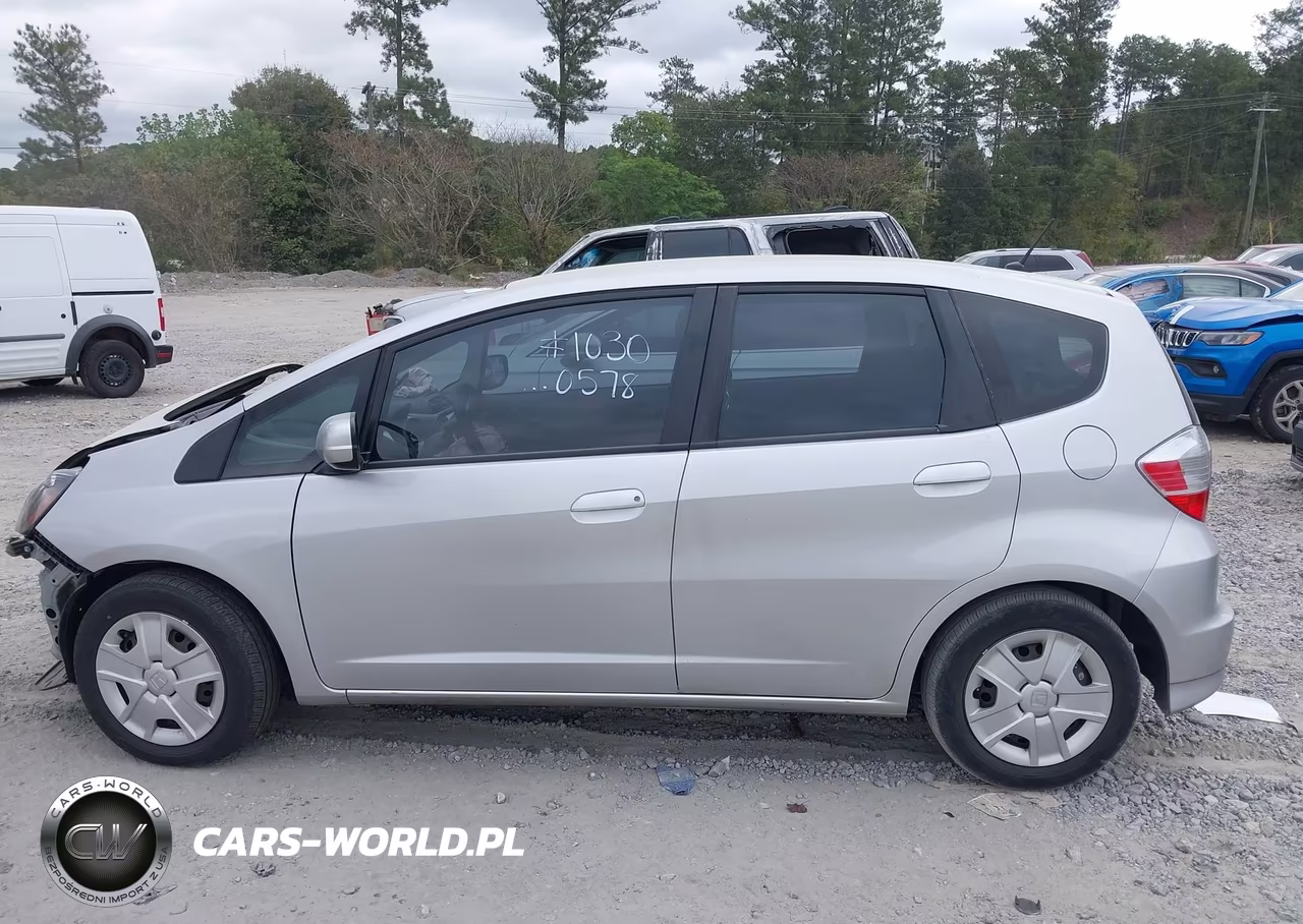2013 Honda Fit VIN:JHMGE8H34DC080578 - 14