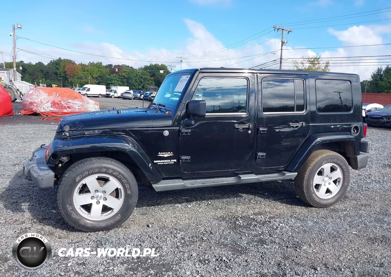 2012 Jeep Wrangler Unlimited Sahara VIN:1C4BJWEG2CL198579 - 14