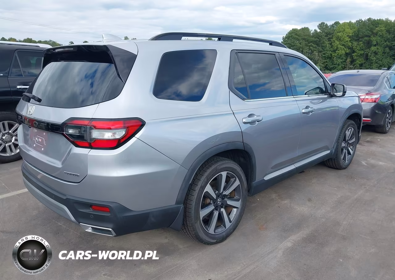 2023 Honda Pilot Awd Touring VIN:5FNYG1H74PB021371 - 4