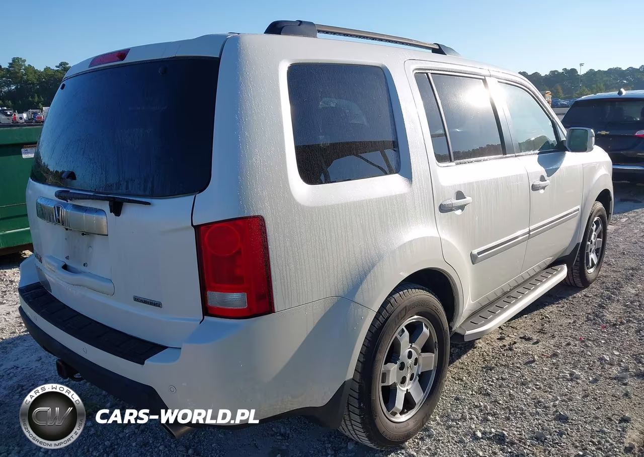 2011 Honda Pilot Touring VIN:5FNYF3H97BB039596 - 4