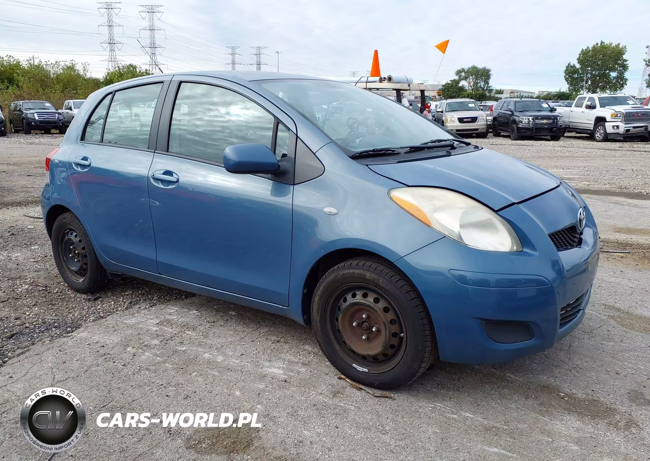 2010 Toyota Yaris VIN:JTDKT4K30A5325203 - 1
