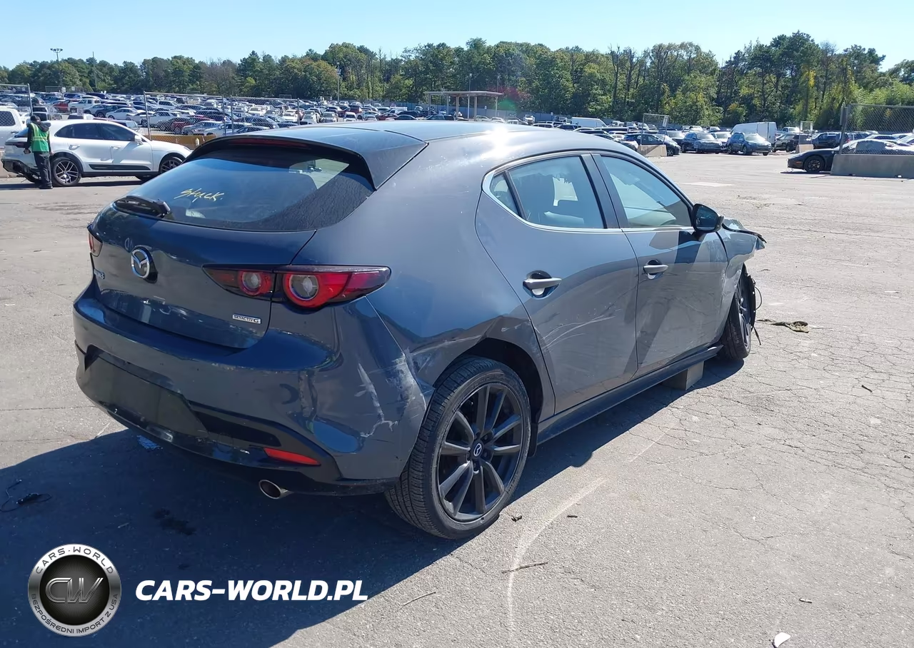 2022 Mazda Mazda3 Carbon Edition VIN:JM1BPALL8N1502644 - 4