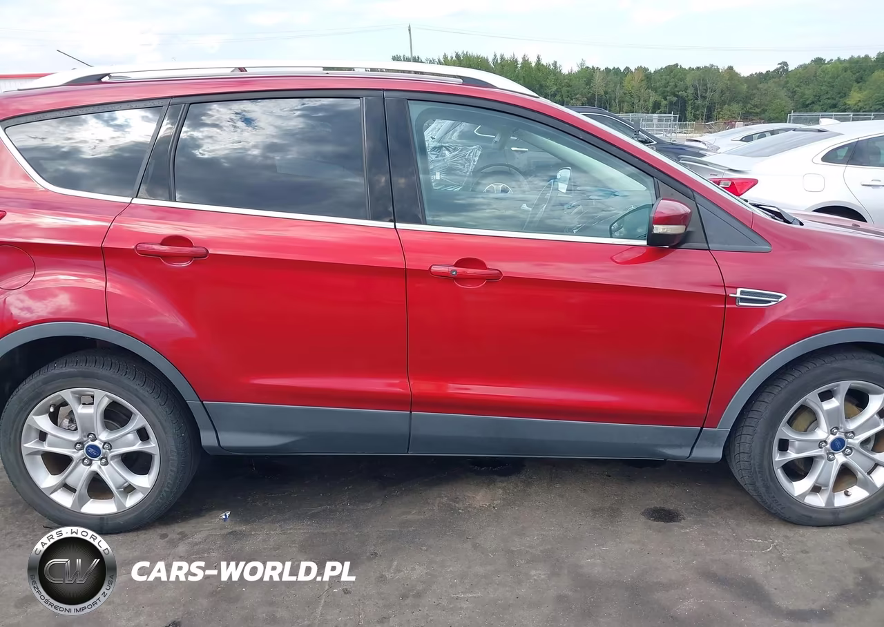 2015 Ford Escape Titanium VIN:1FMCU0JX1FUC73670 - 13