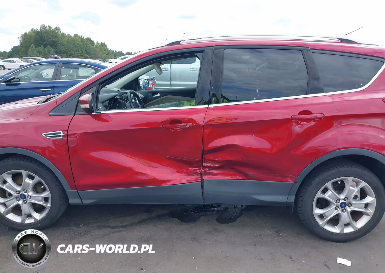 2015 Ford Escape Titanium VIN:1FMCU0JX1FUC73670 - 14