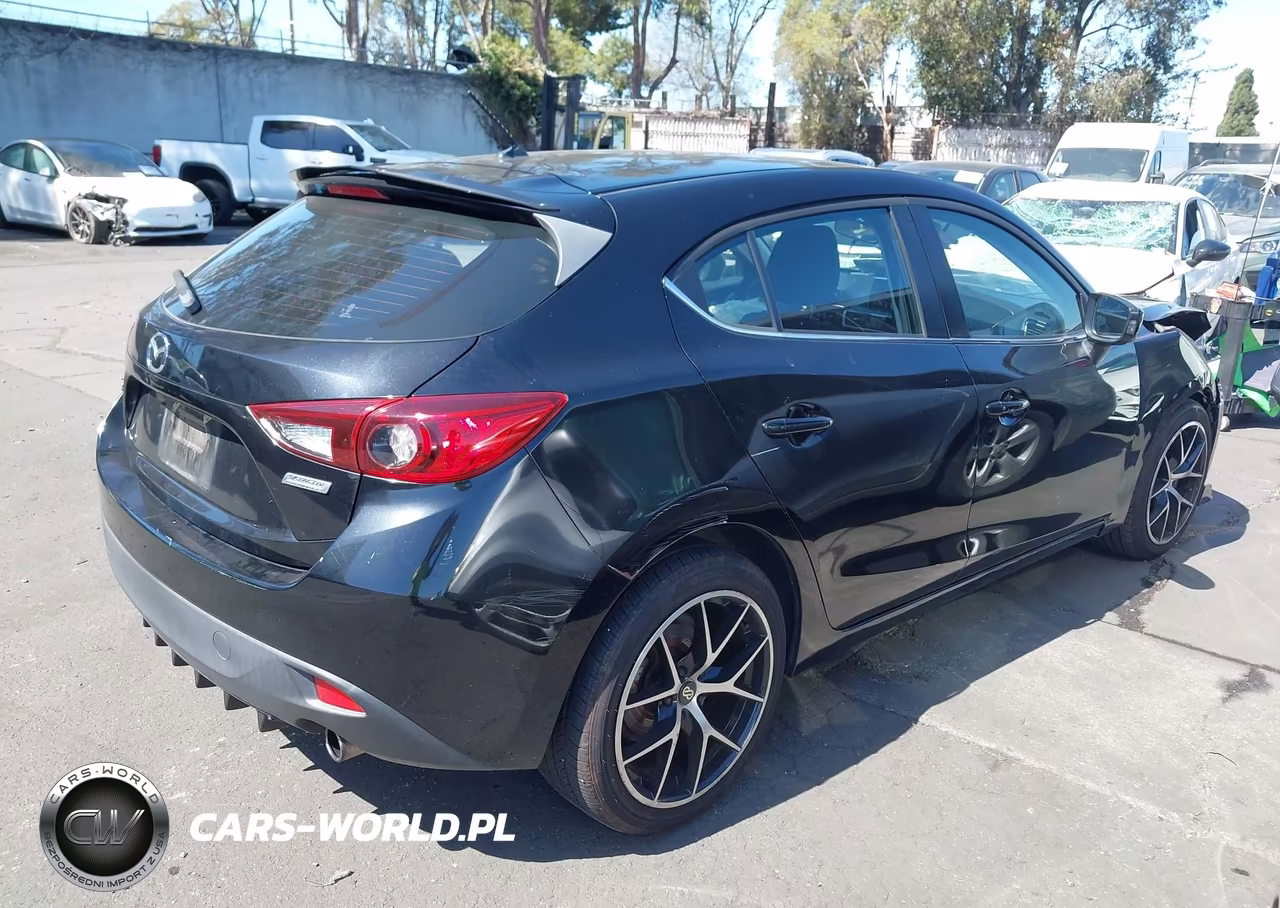 2015 Mazda Mazda3 I Touring VIN:JM1BM1L79F1261299 - 4