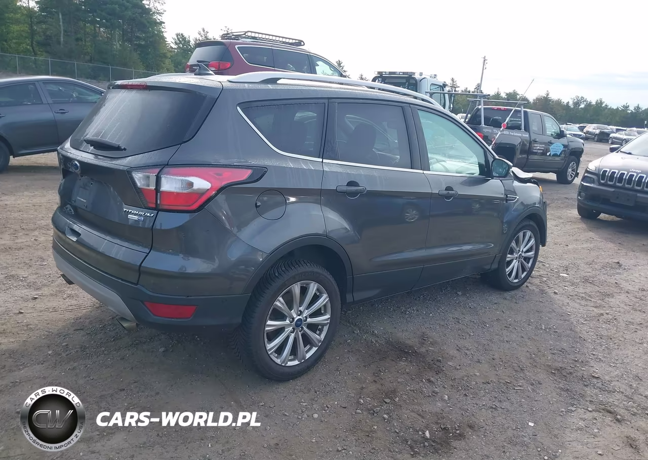 2018 Ford Escape Titanium VIN:1FMCU9J92JUB33156 - 4