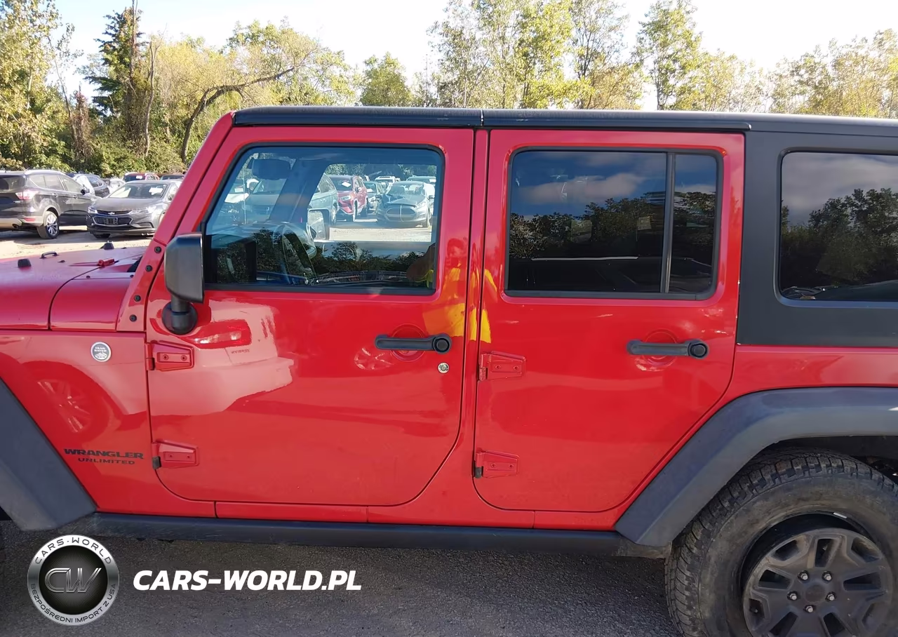 2015 Jeep Wrangler Unlimited Willys Wheeler VIN:1C4BJWDGXFL634620 - 14