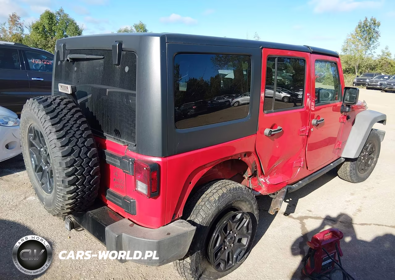 2015 Jeep Wrangler Unlimited Willys Wheeler VIN:1C4BJWDGXFL634620 - 4