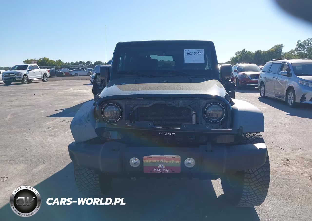 2010 Jeep Wrangler Sport VIN:1J4GA2D11AL219005 - 12
