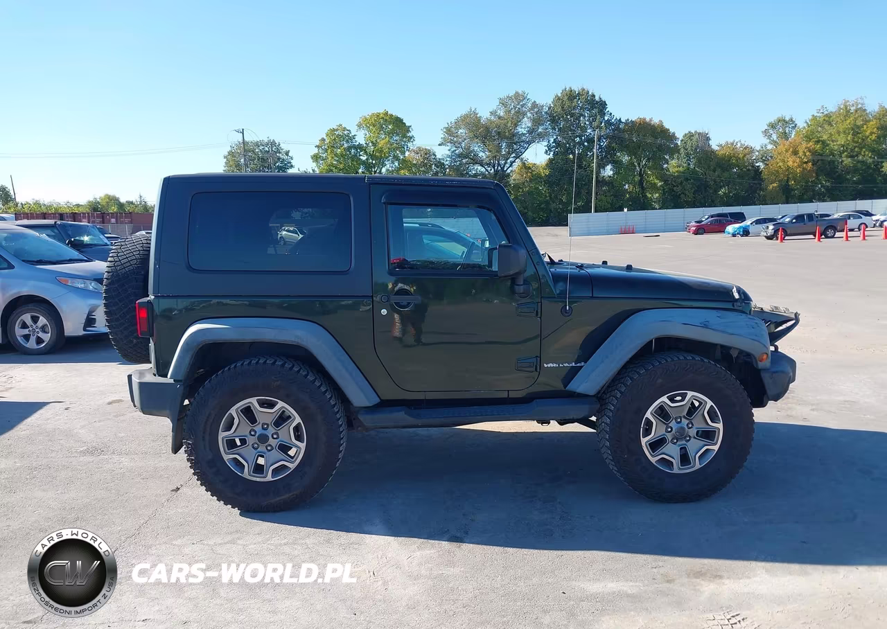 2010 Jeep Wrangler Sport VIN:1J4GA2D11AL219005 - 13