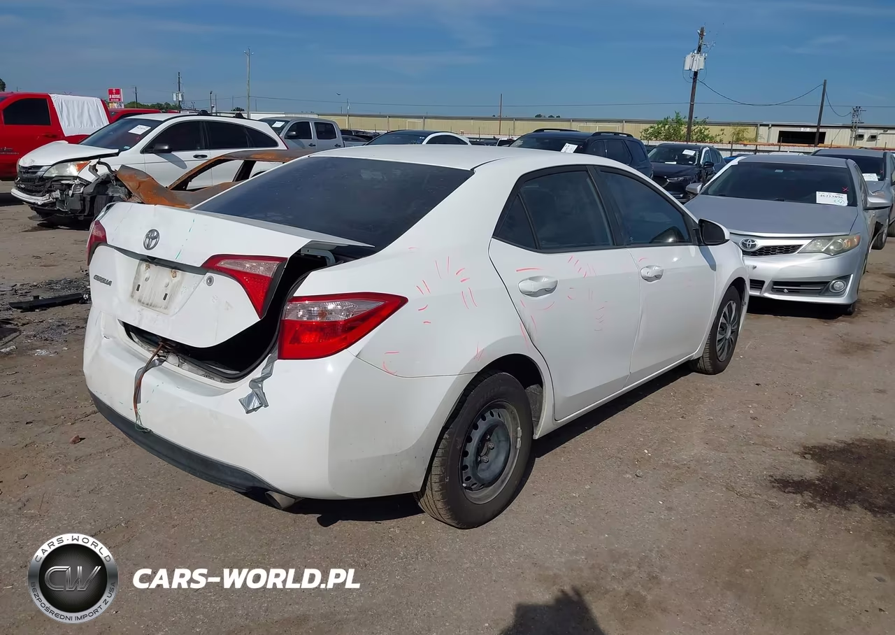 2017 Toyota Corolla L VIN:5YFBURHEXHP669069 - 4