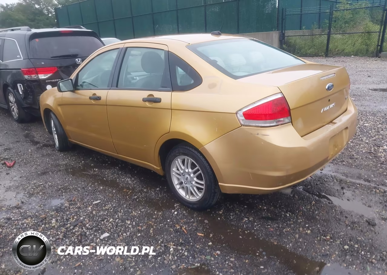 2009 Ford Focus VIN:1FAHP35N09W231131 - 3
