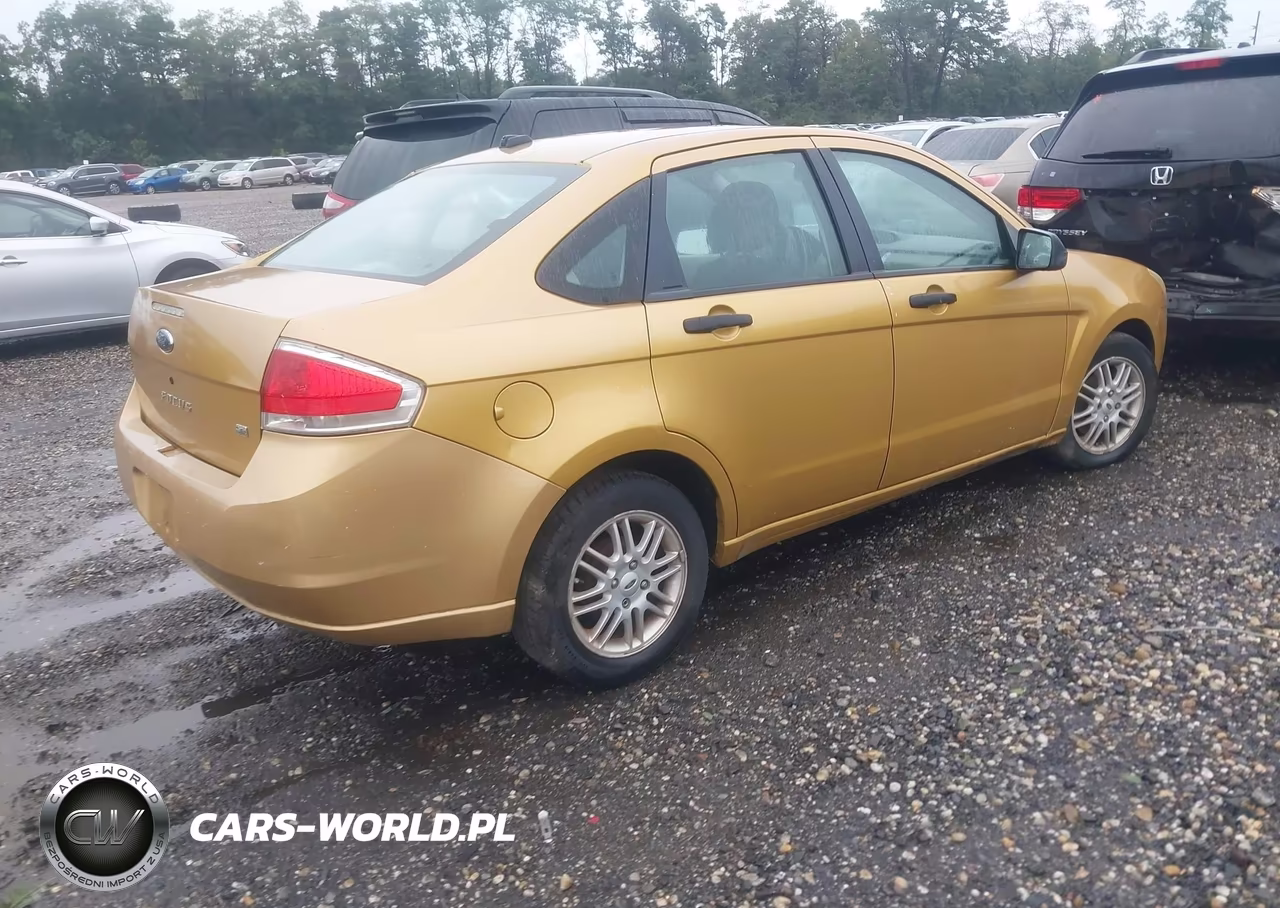 2009 Ford Focus VIN:1FAHP35N09W231131 - 4