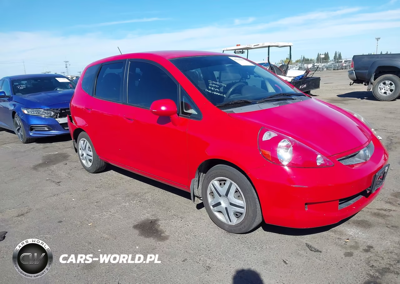 2007 Honda Fit VIN:JHMGD38477S048247 - 1