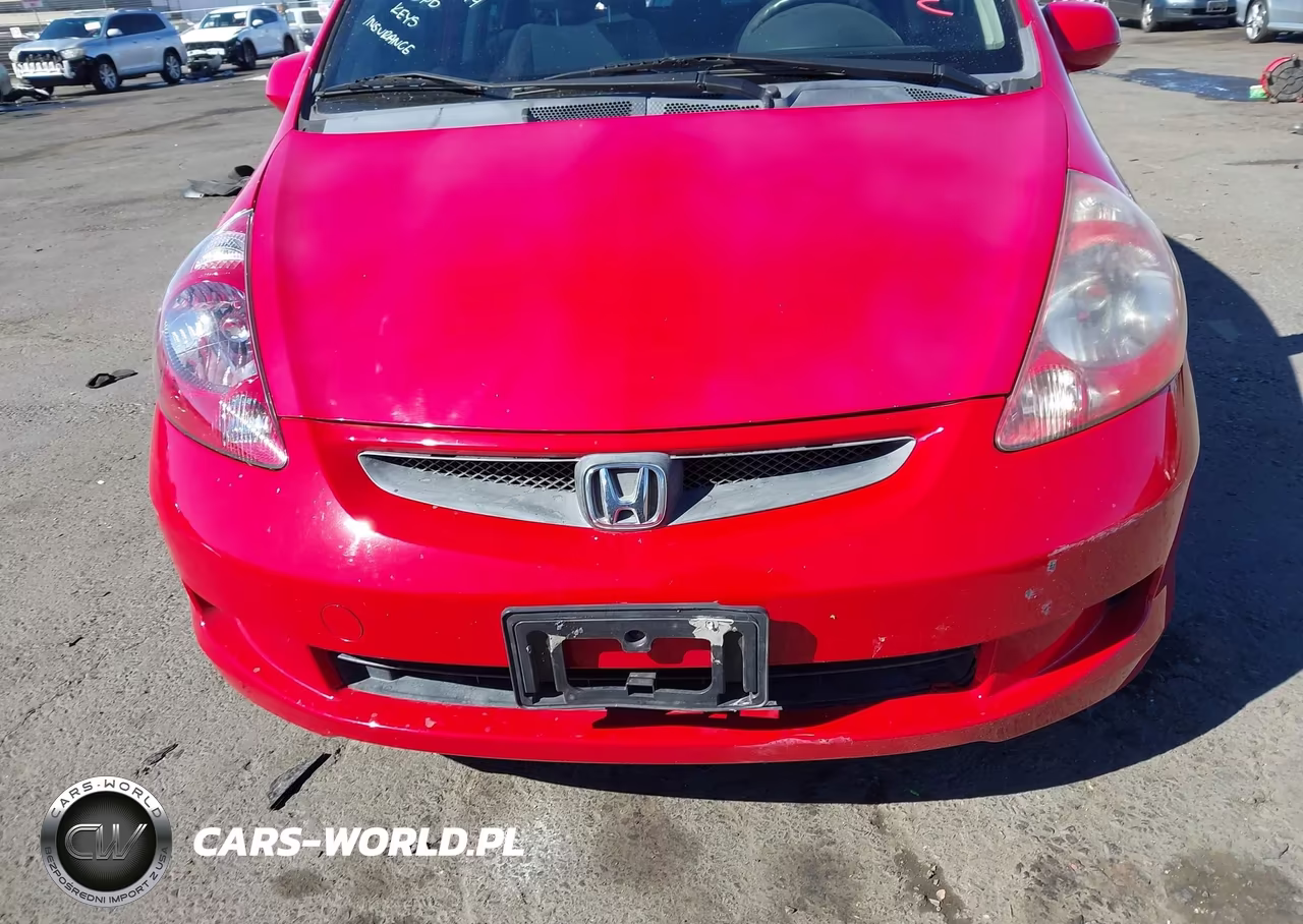 2007 Honda Fit VIN:JHMGD38477S048247 - 12