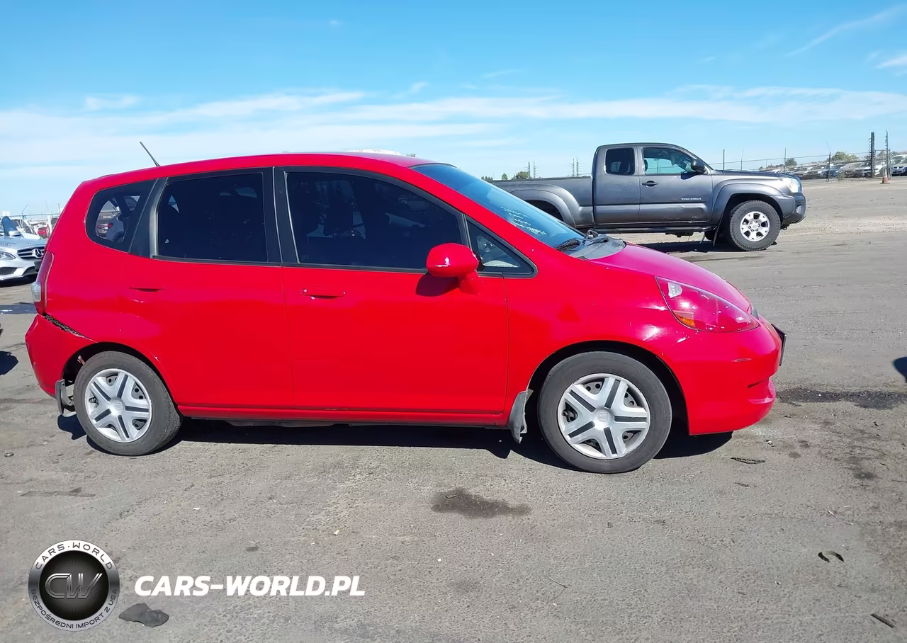 2007 Honda Fit VIN:JHMGD38477S048247 - 13