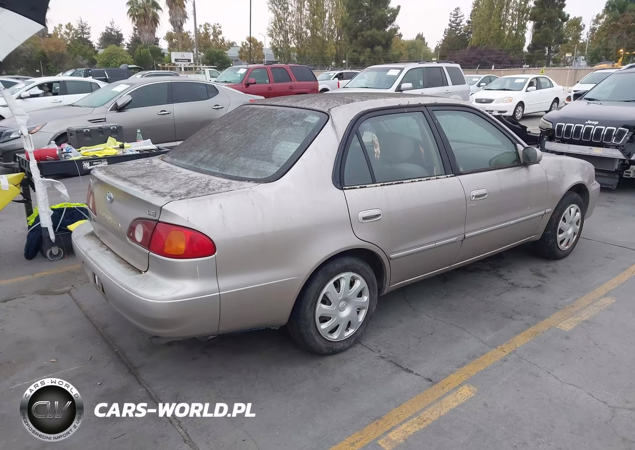 2001 Toyota Corolla Le VIN:1NXBR12E71Z451011 - 4
