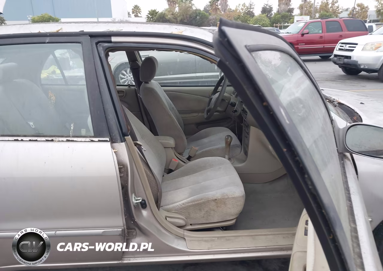 2001 Toyota Corolla Le VIN:1NXBR12E71Z451011 - 5