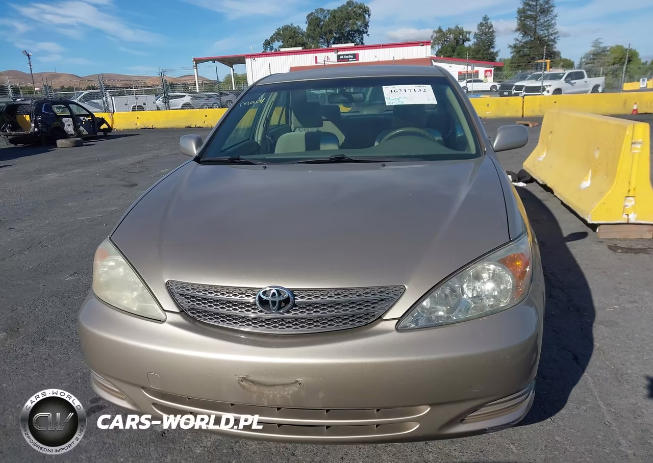 2002 Toyota Camry Le VIN:JTDBE32K020080834 - 12