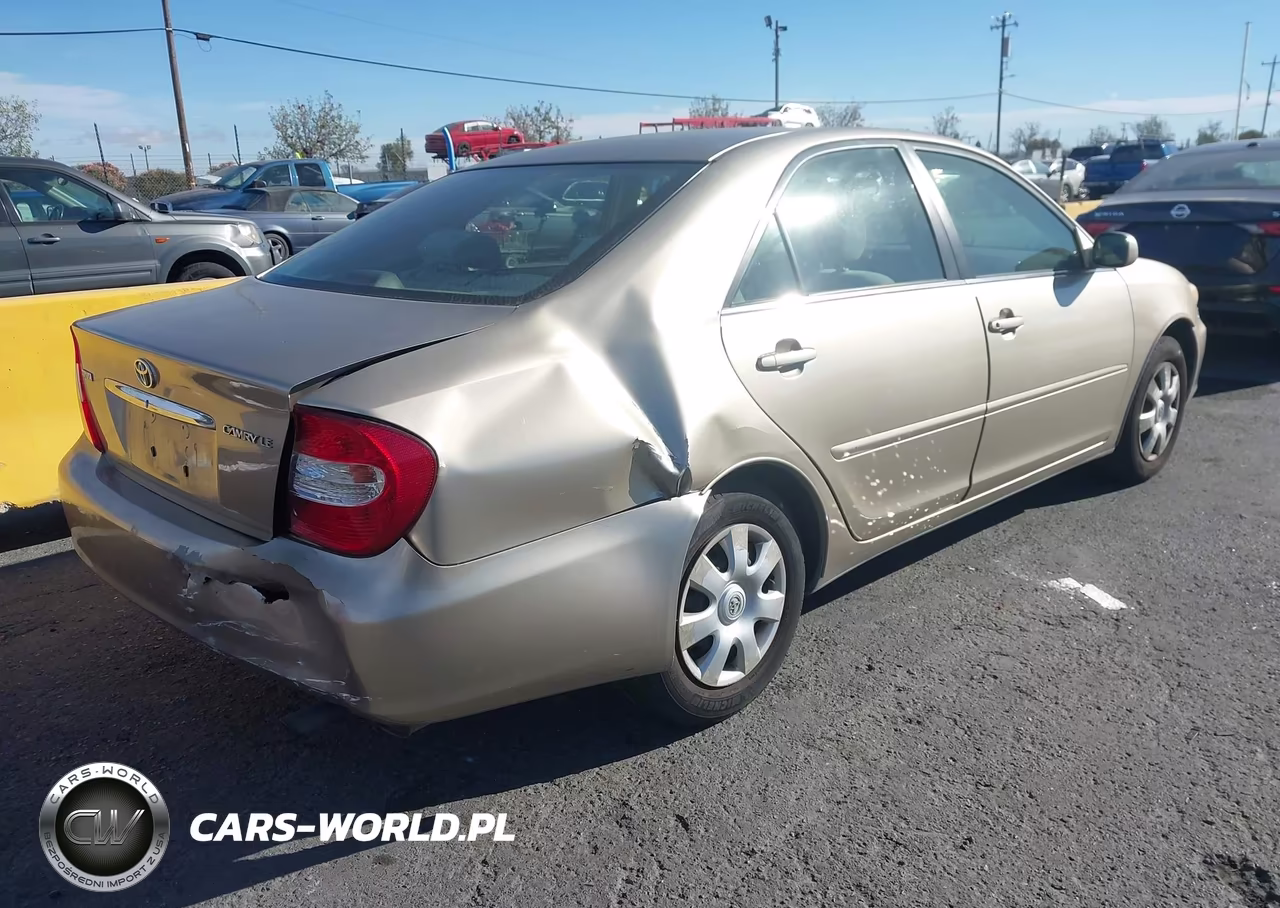 2002 Toyota Camry Le VIN:JTDBE32K020080834 - 4