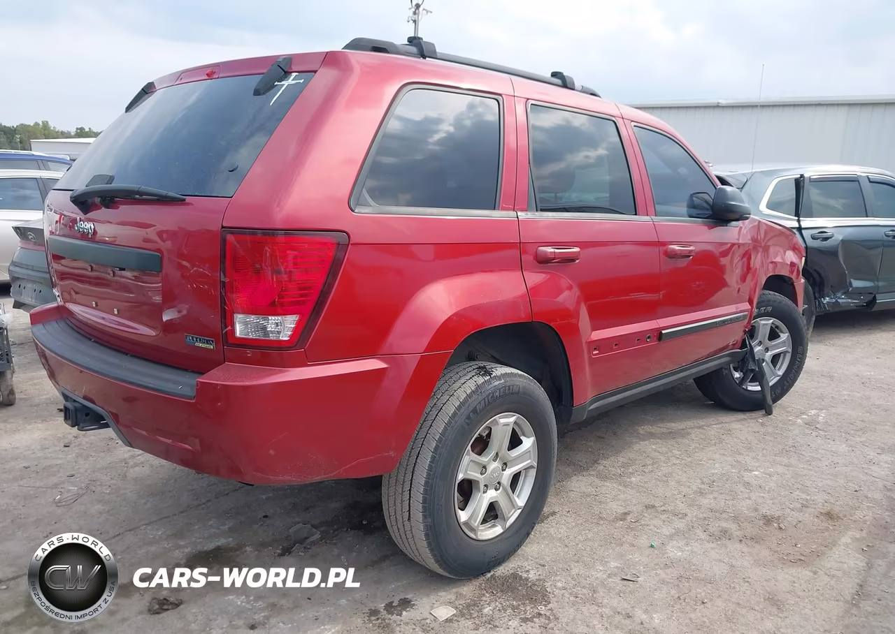 2009 Jeep Grand Cherokee Laredo VIN:1J8HS48P99C545544 - 4